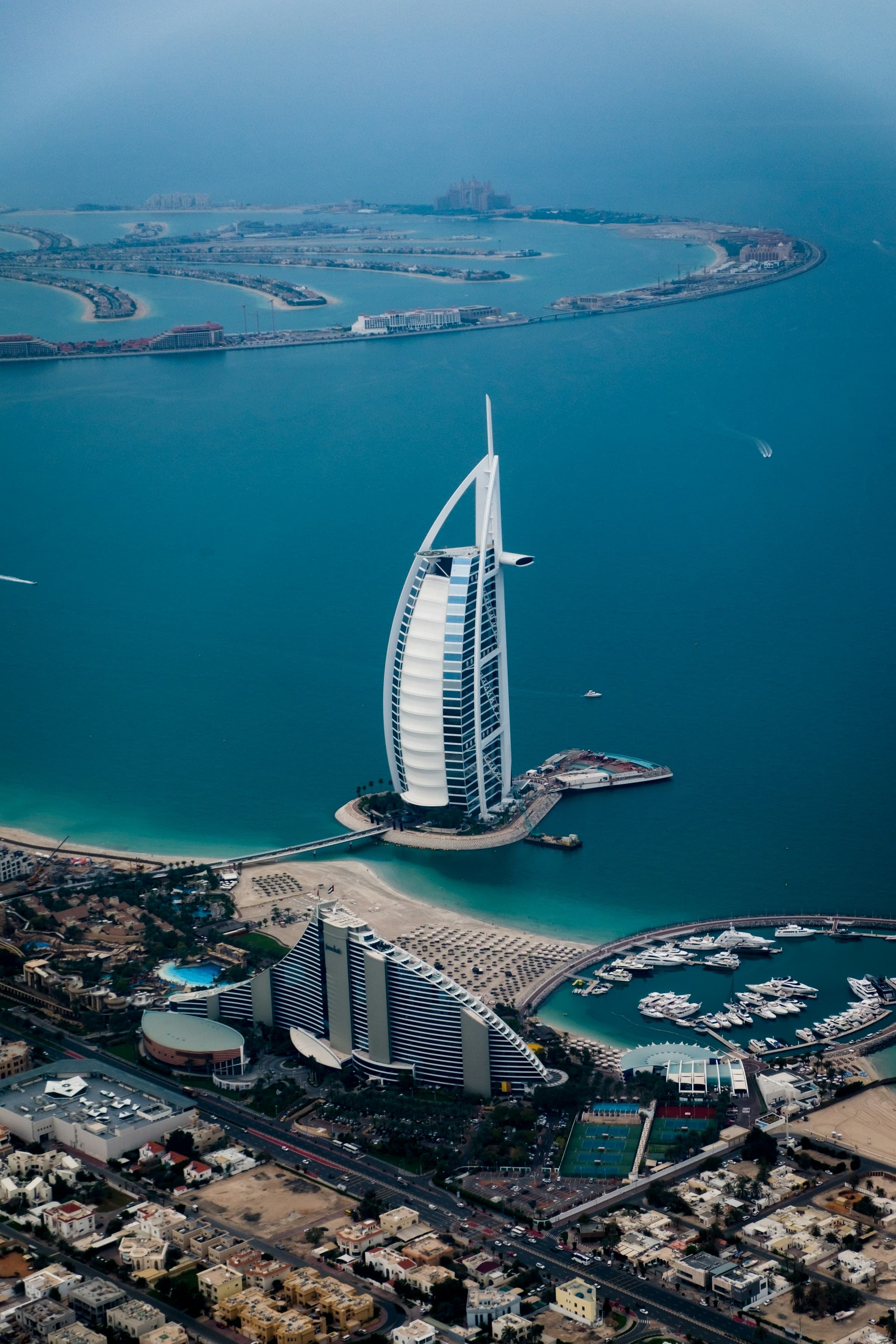 Dubai Marina and Gulf waterfront towers under bright sky
